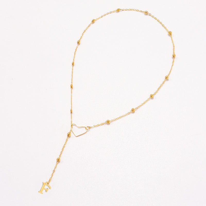 Hollow heart-shaped letter necklace